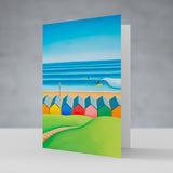 Carve Your Own Path greeting card – Saltburn beach huts and surf art card by Matt Whaley