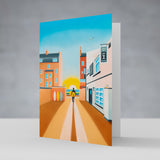 Drinking in the Morning Sun greeting card – Saltburn surf art by Matt Whaley